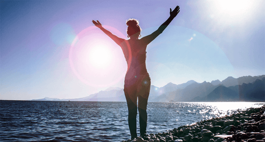person on beach in joy